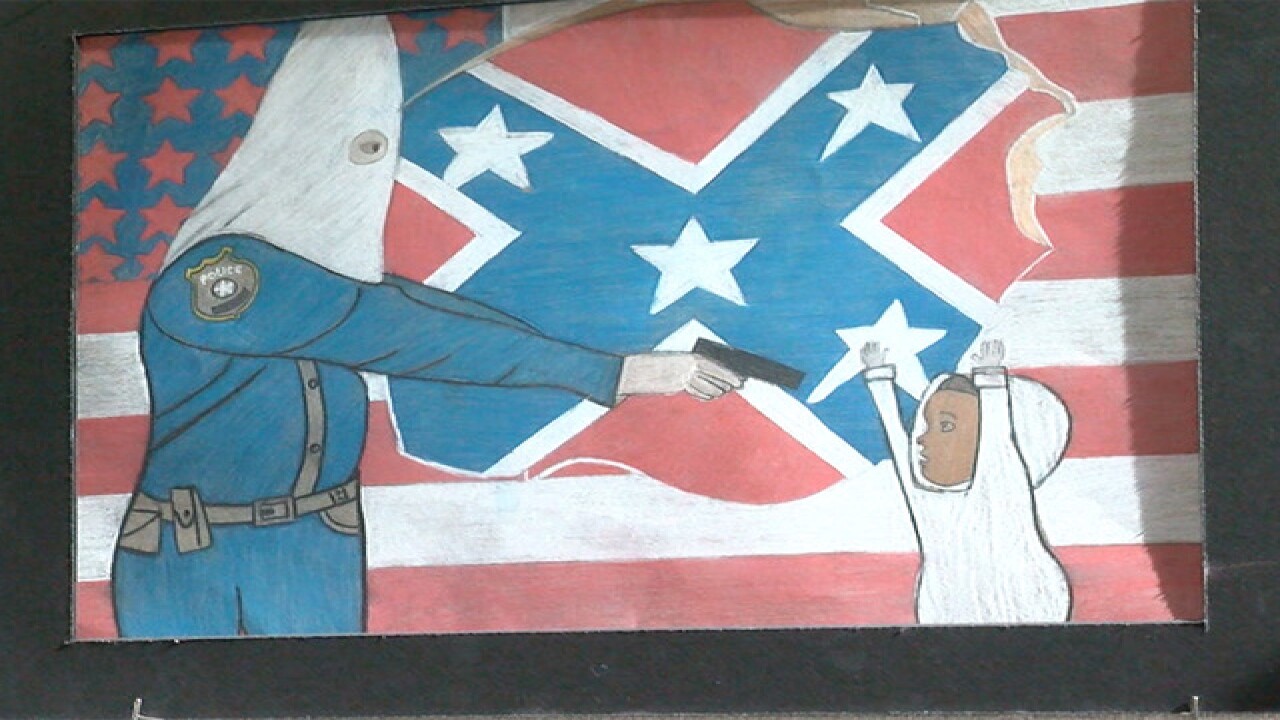 KKK drawing Mayor, DPD Chief, talk with artist